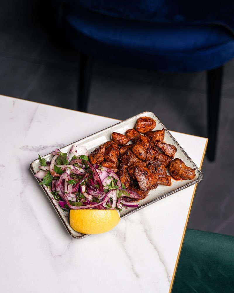 Lamb liver and onions fresh from the charcoal