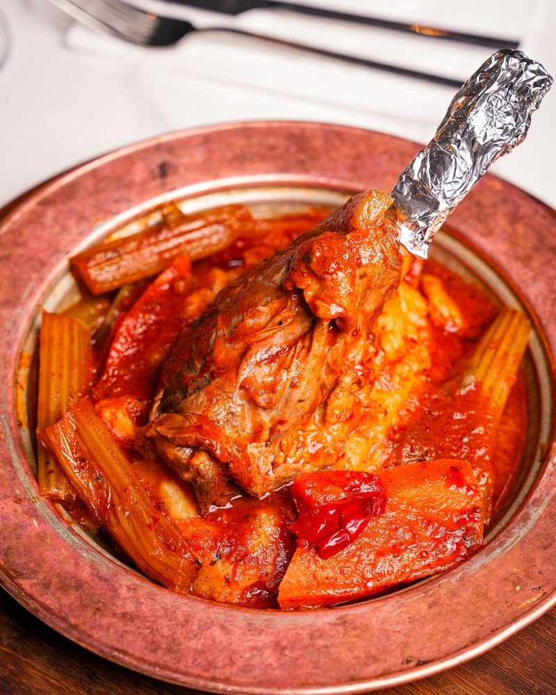 Kleftiko — braised lamb shank on a copper plate